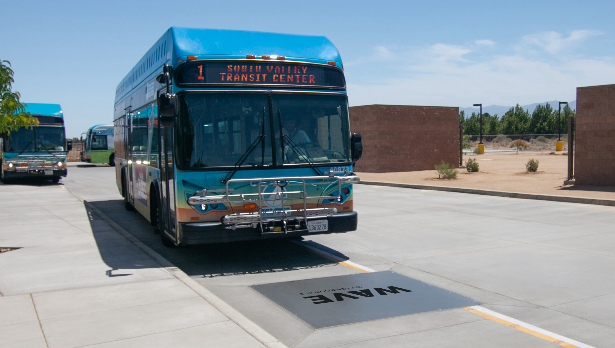 AVTA Bus Approaching WAVE Wireless Charging Pad